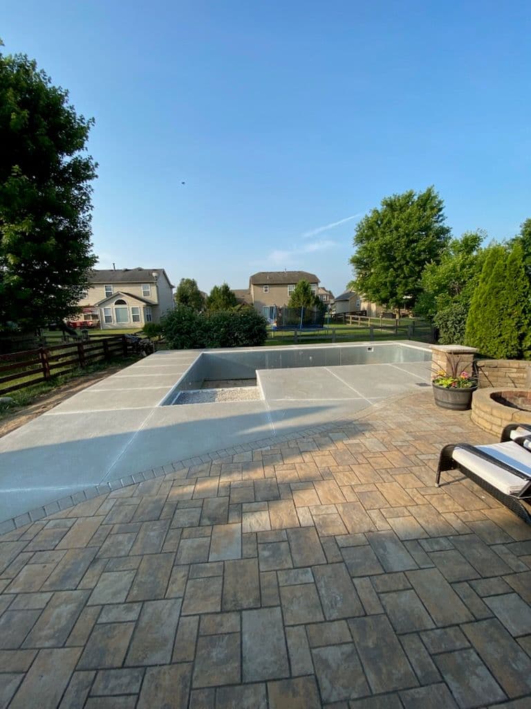 Revitalize Your Backyard with Stunning Pool Transformation image